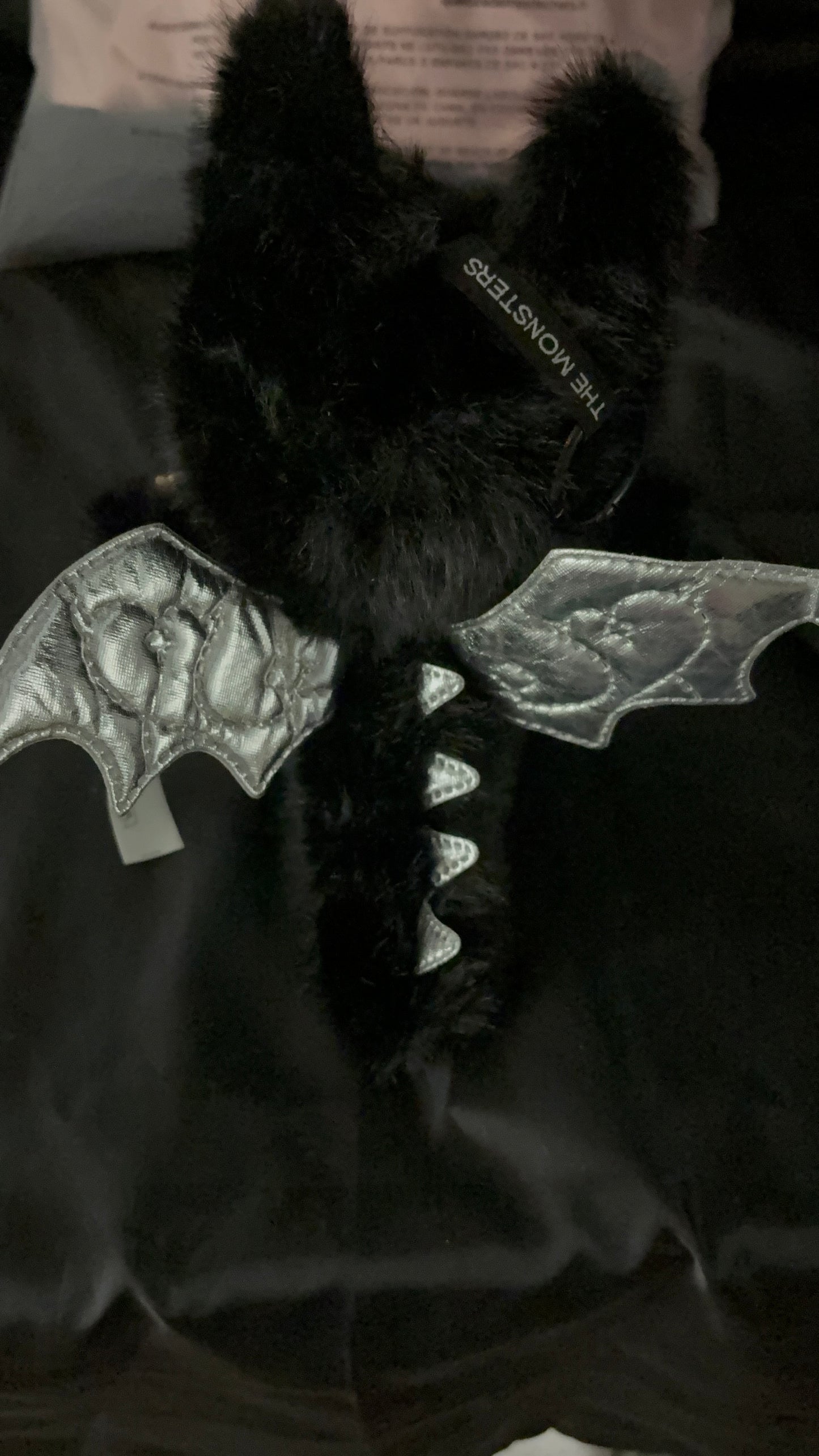 The Monsters black and plush with wings