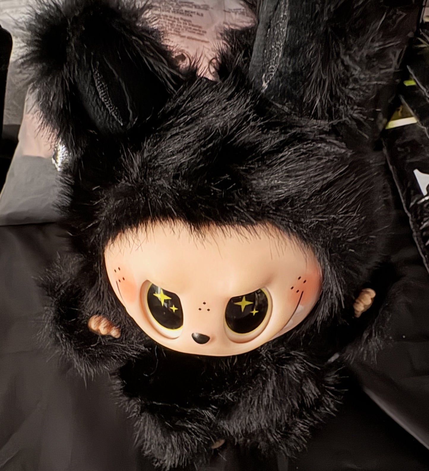 The Monsters black and plush with wings